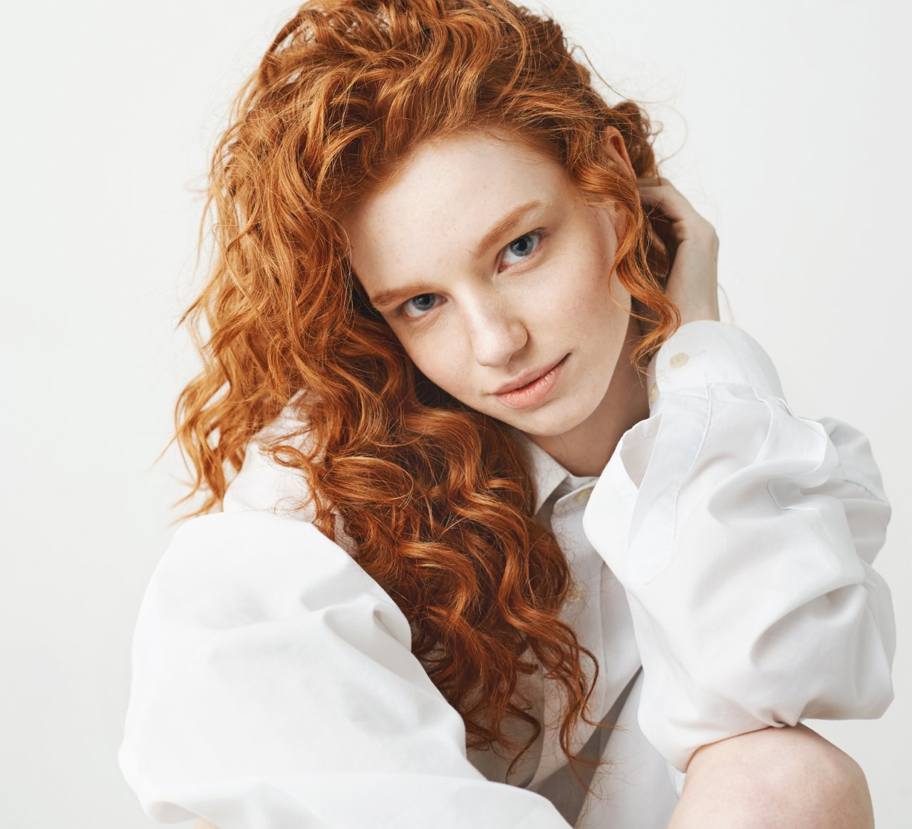 portrait-cute-tender-ginger-woman-with-curly-hair